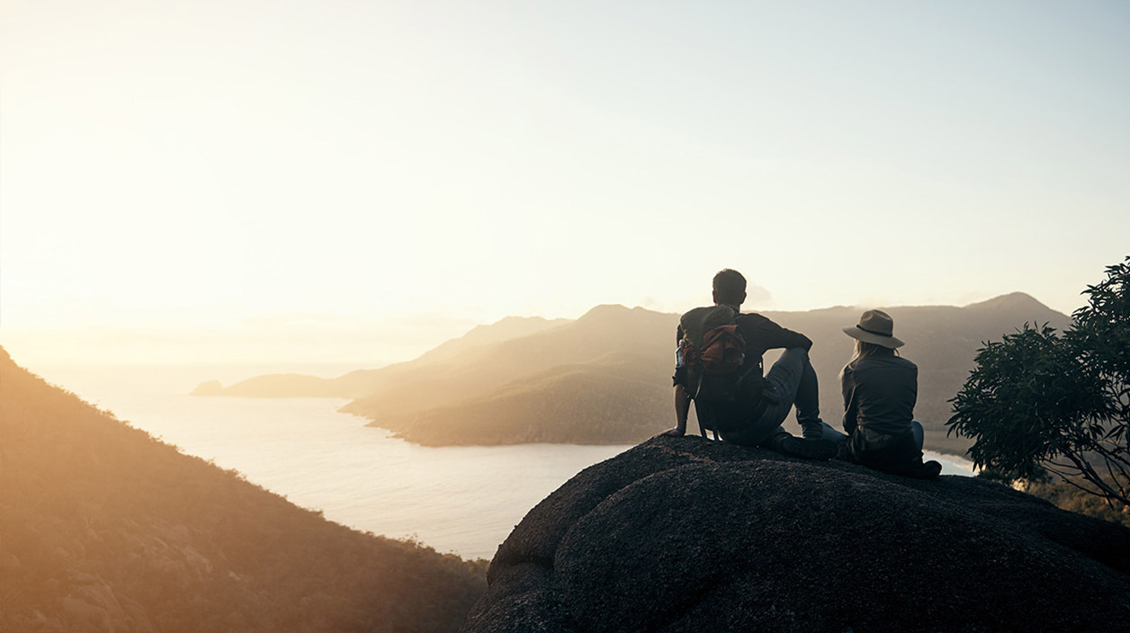 Young couple hiking in the mountains