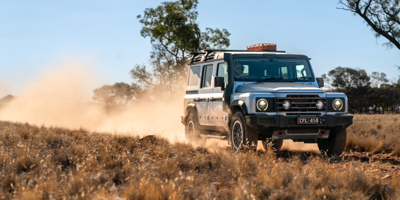 2024 Ineos Grenadier driving through dust