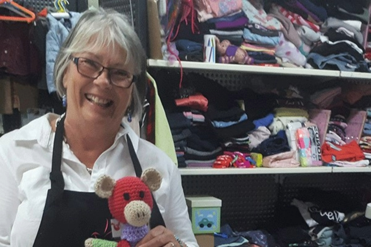 woman-with-plush-and-donations-1200x800 Slide 1