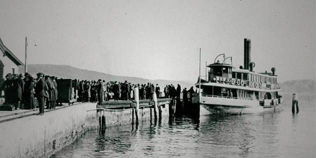 historic black and white photo of Manly ferry docking at Q Station Sydney