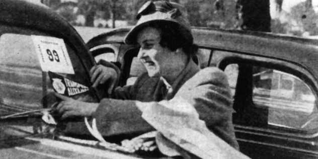 historic black and white image of a member of the women's auxiliary transport corps with her car 1939