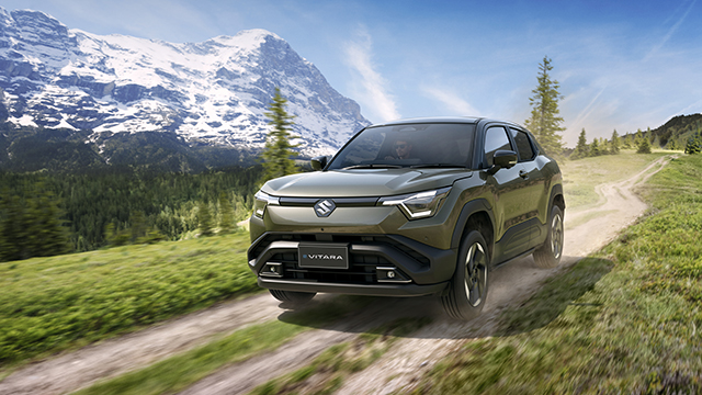 2026 Suzuki eVitara driving on a country track