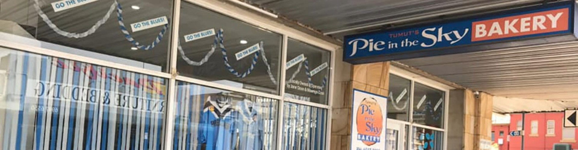 A view of the Pie in the Sky shop facade from the street.