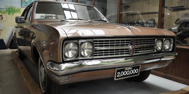 Front view of a brown 1960 Holden Stateman.