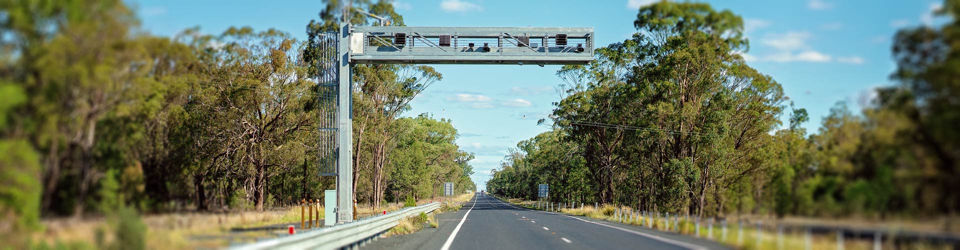 An average speed safety camera above a country road