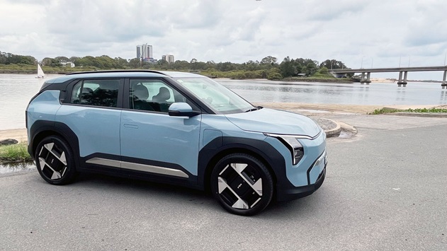 Kia EV3 Earth in blue next to a body of water