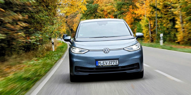 A Volkswagen ID3 driving along a country road