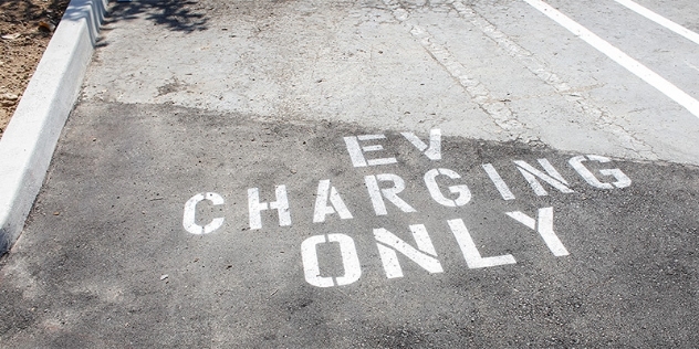 A parking bay marked 'EV charging only'