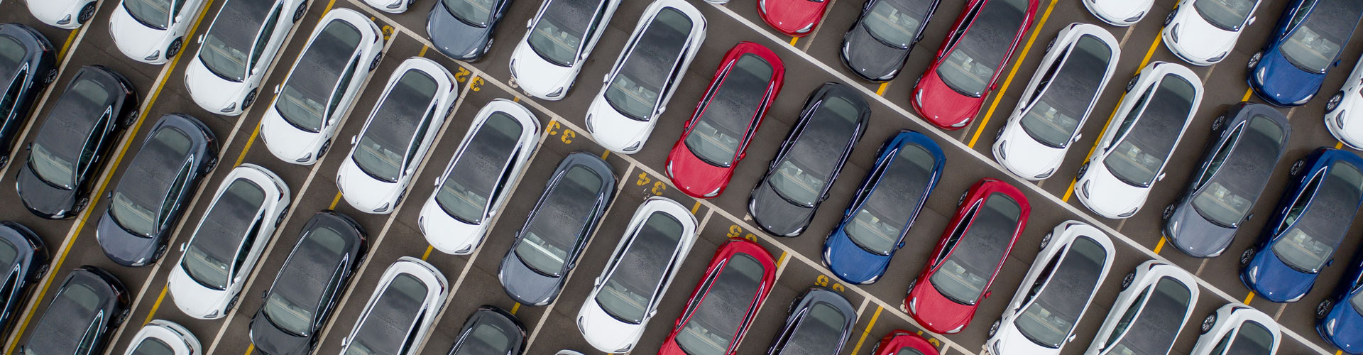 Aerial view of Tesla Model Y electric cars in a car park