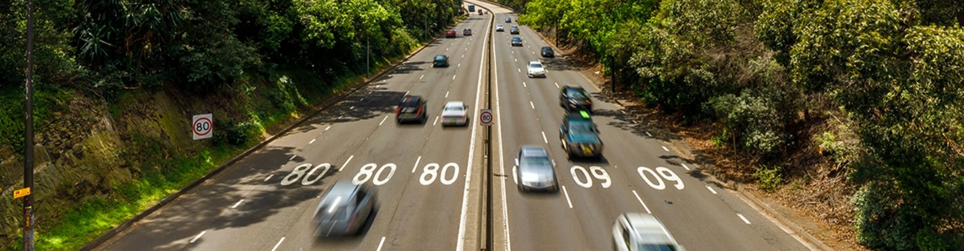 Ariel view of two busy highway lanes.