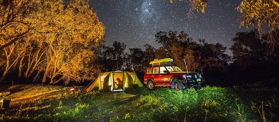 Camping in outback Australia A car and a tent at a campsite in outback Australia