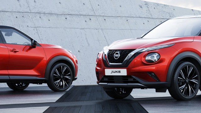 2024-Nissan-Juke-640x360 Two red SUVs facing each other on a concrete slab.