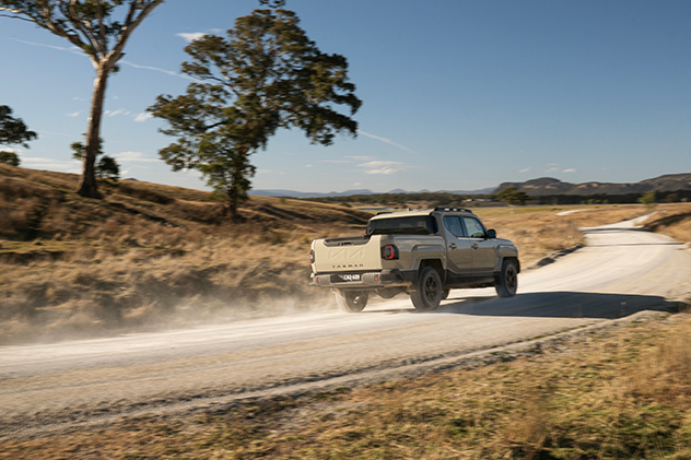2025 Kia Tasman rear driving shot