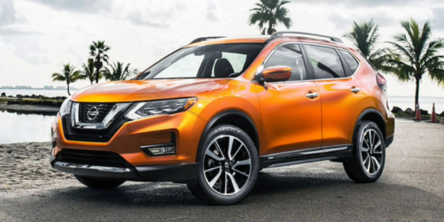 Side-angle of an orange Nissan SUV.