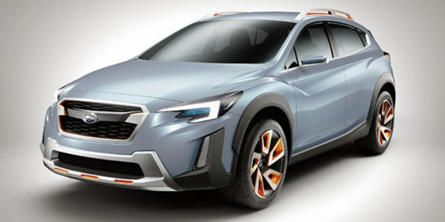 Front-angle view of a grey Subaru SUV.