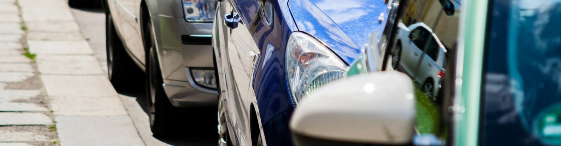 A row of cars in traffic.