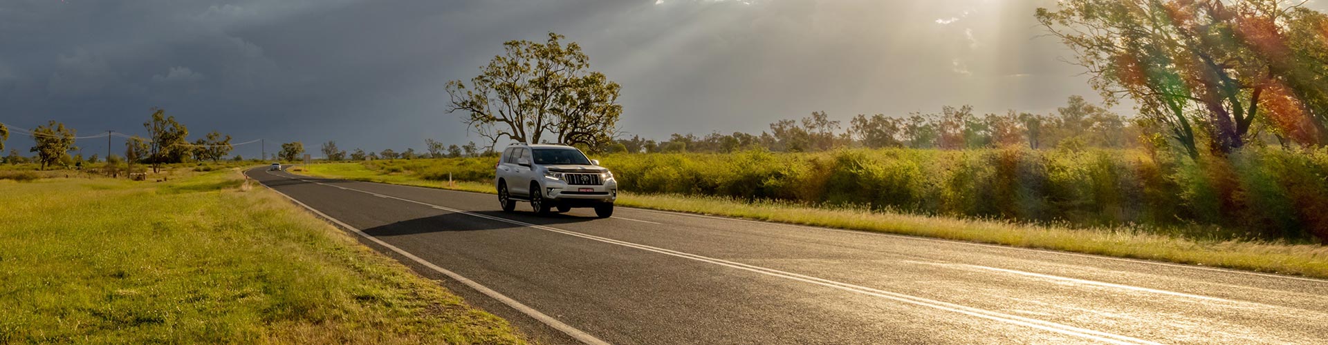 Car travelling on a rural road