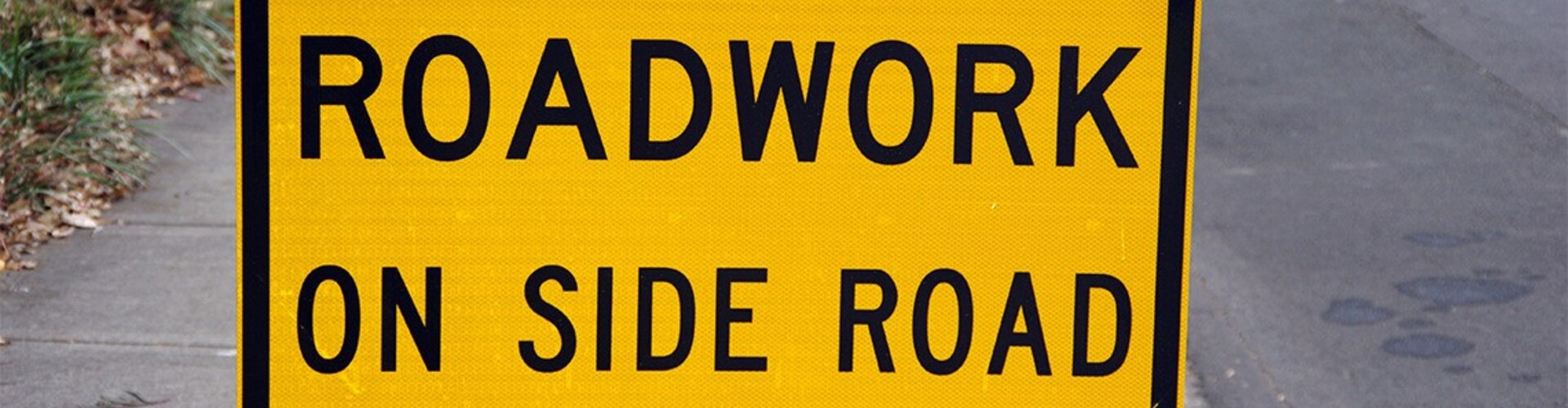 A yellow council roadworks sign