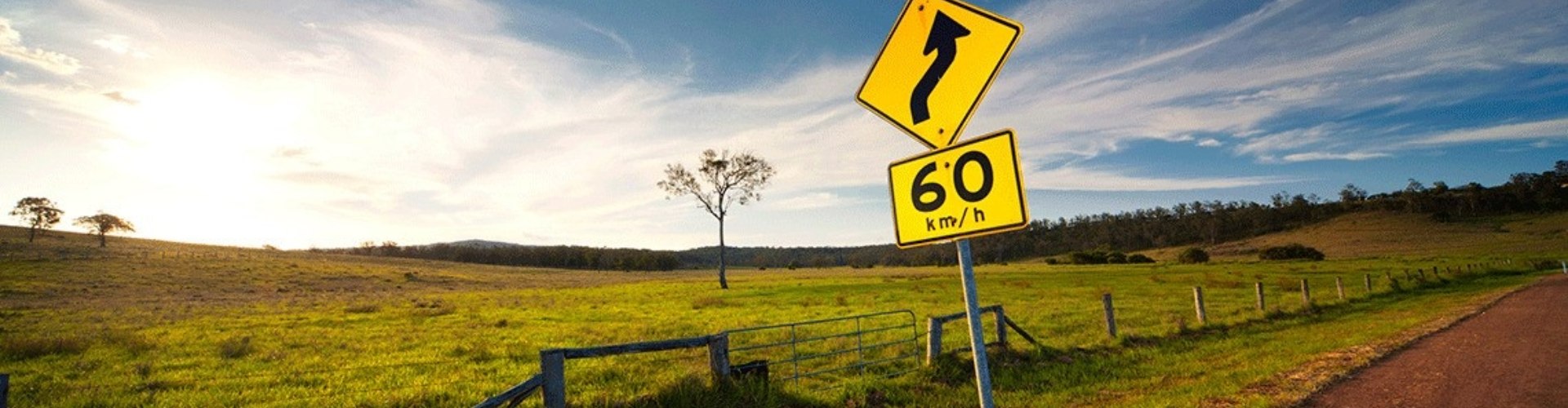 A speed limit sign on a country road
