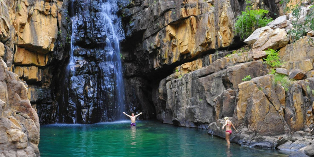 Visitors enjoying a waterfall near Katherine, NT