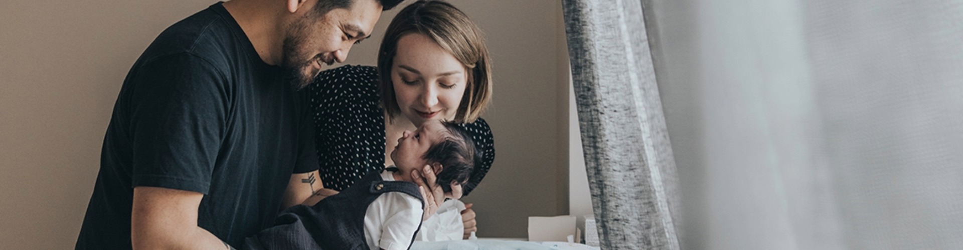 Parents with their new born baby
