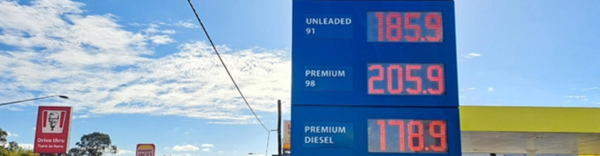 A service station sign showing petrol prices