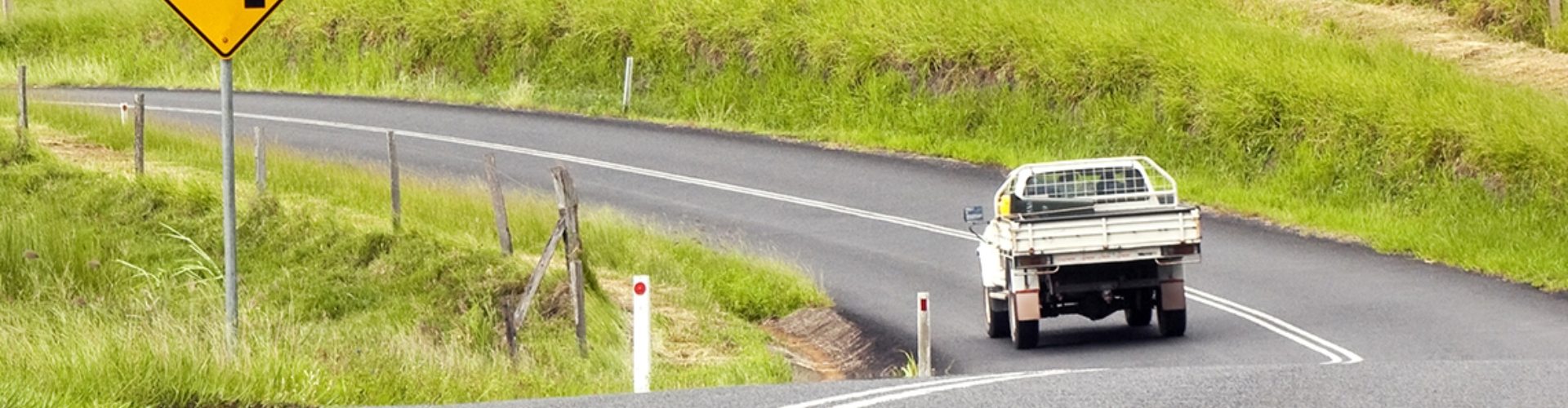 A ute driving on a country road