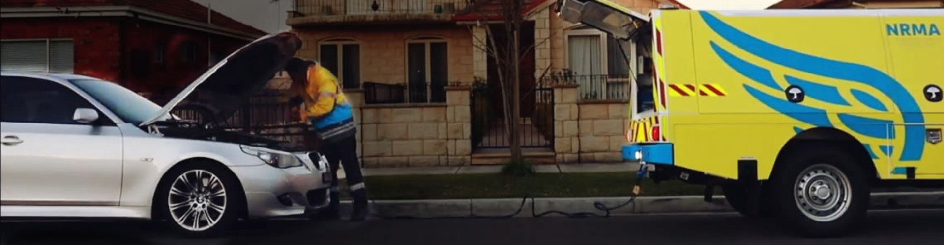 An NRMA patrol driver attends to a broken down car