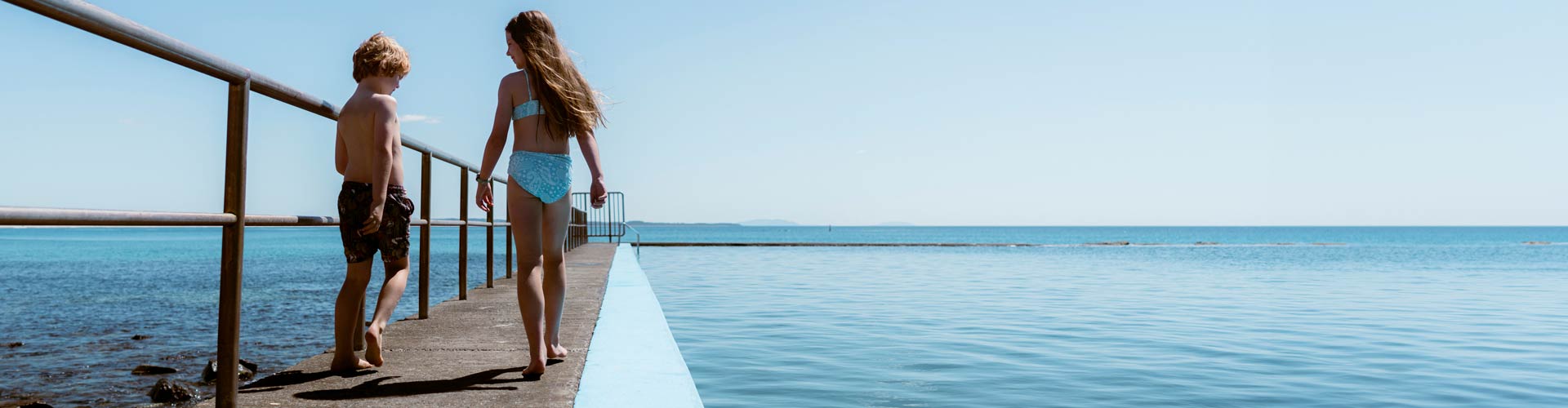Children enjoying a sunny day at Forster Ocean Baths, Forster.