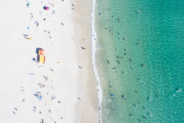 Aerial view of white sand and turquoise water on a Gold Coast beach
