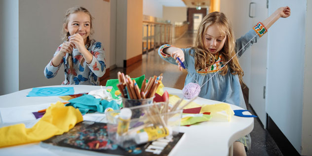 Two children at an art workshop