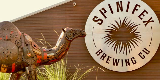Sculpture of a camel by Spinifex Brewery sign