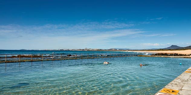 Swimmers enjoying laps at Towradgi Rock Pool, north of Wollongong.