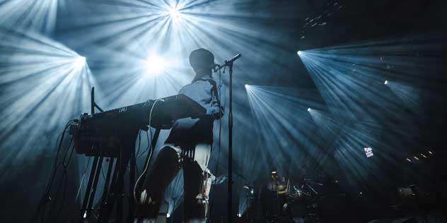 People enjoying the lights at night during Sydney's Vidid Festival 2024