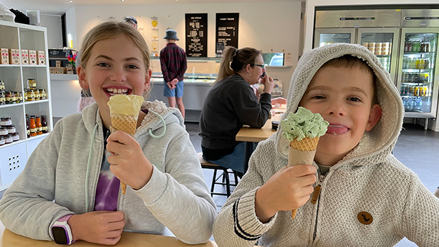 Two kids holding ice creams in Timboon Fine Ice Cream
