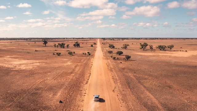 Broken Hill to Pooncarie NSW Car driving on dirt road from Broken Hill to Pooncarie NSW