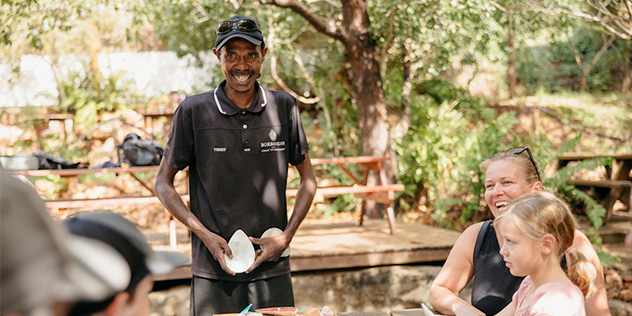 Guide Terry Hunter showcasing the Cygnet Bay pearl bounty with guests in Western Australia