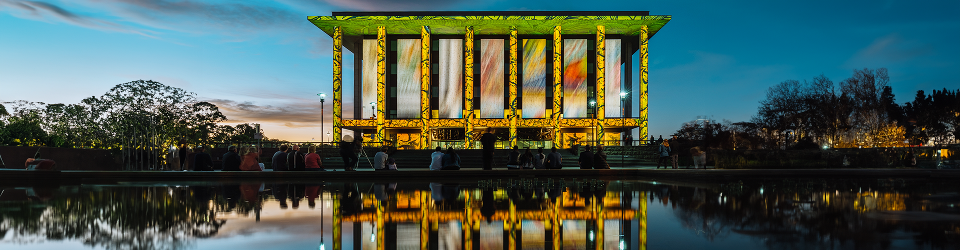 Artistic lights beamed onto a building fascade