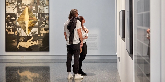 Couple looking at artwork at Murray Art Museum Albury NSW