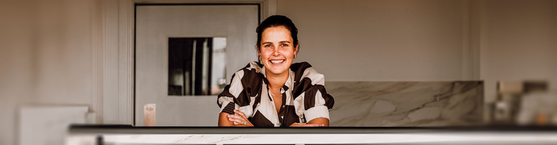 Kat Montgomery sitting at a bench