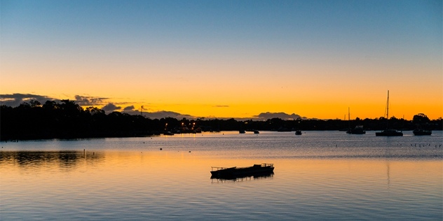 sun sets over the water at streaky bay south australia