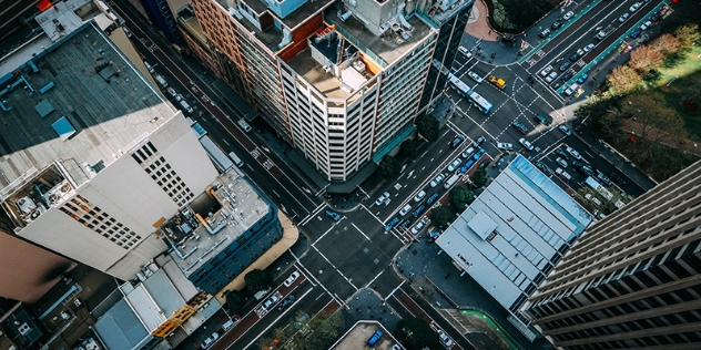 arial view of above skyscrapers and a busy crossroads in the heart of the Sydney CBD