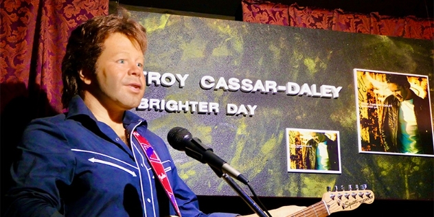 life size wax figure of country singer Troy Cassar-Daley with guitar and microphone