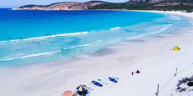 people relax on the white sandy beach at Thistle Cove in Esperance WA