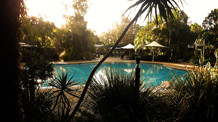 swimming pool at dusk at Angourie Resort