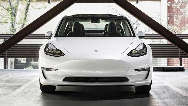 Tesla electric car in carpark
