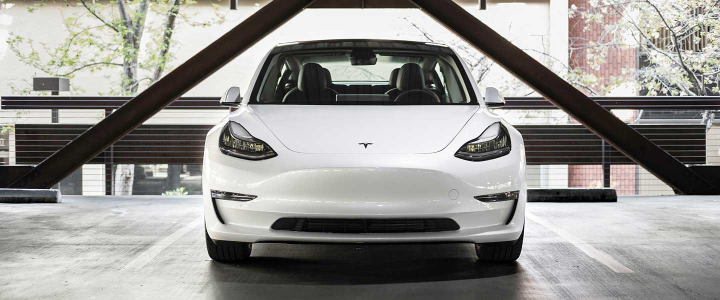 Tesla electric car in carpark