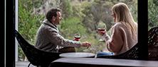 Freycinet Lodge couple drinking wine